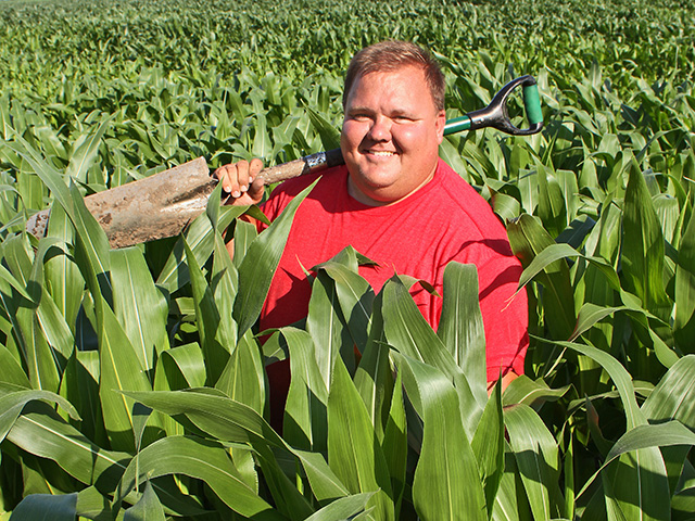 A spade is Pat Sanstromâ€™s tool of choice for uncovering problems in his Illinois corn fields. (Progressive Farmer image by Pamela Smith)